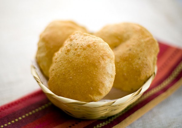 Puffed pooris in a basket